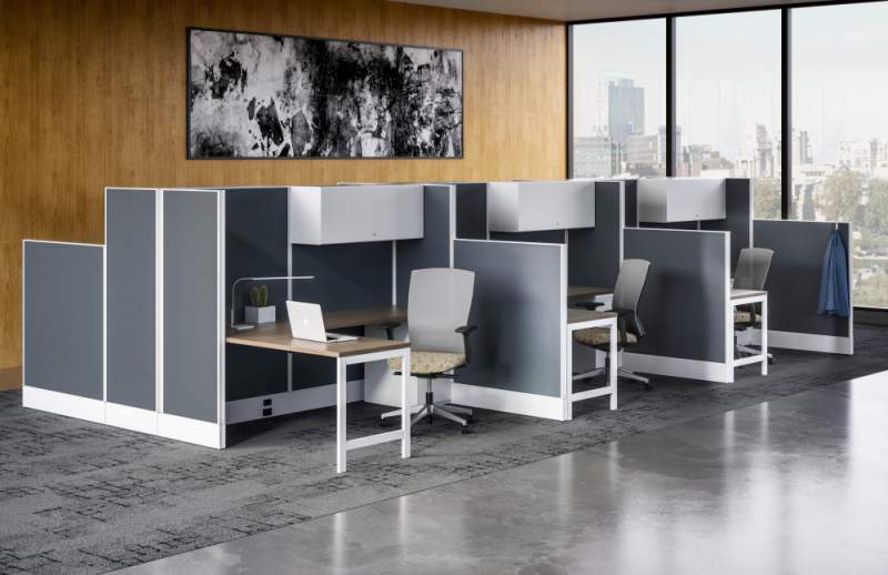 Gray cubicles with a wood background